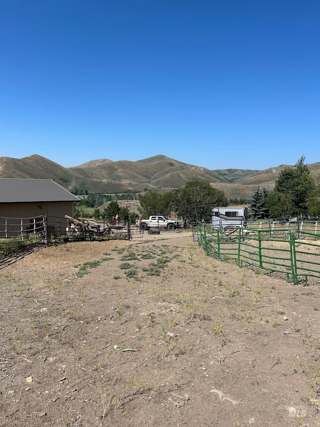 property view of mountains with a rural view