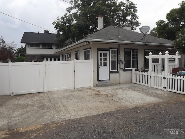 view of front of property with a patio