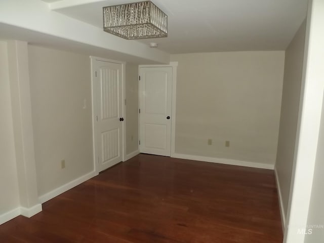 spare room featuring hardwood / wood-style flooring