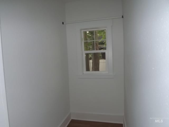 spare room featuring hardwood / wood-style flooring