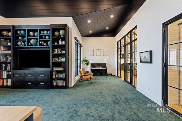 unfurnished room with carpet flooring, wooden ceiling, and a wealth of natural light