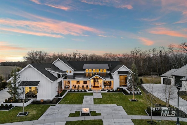 view of front of property with a yard