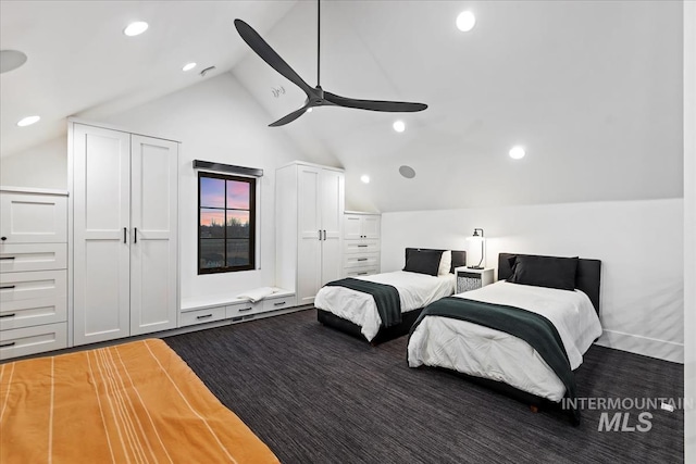 bedroom with vaulted ceiling, hardwood / wood-style flooring, and ceiling fan