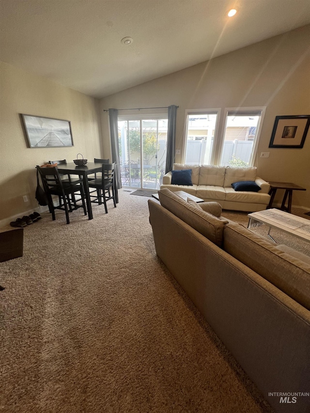 living area featuring recessed lighting, baseboards, carpet, and lofted ceiling