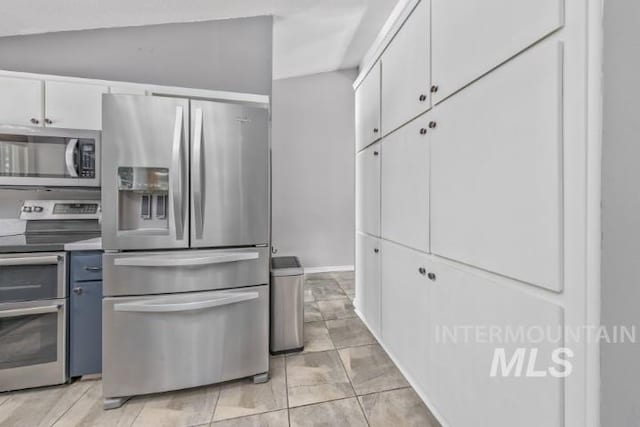 4610 Power Rd, Ontario, OR 97914 - kitchen featuring stainless steel appliances and white cabinetry