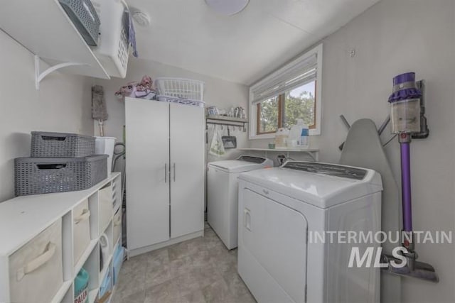 4610 Power Rd, Ontario, OR 97914 - laundry area featuring independent washer and dryer and cabinet space