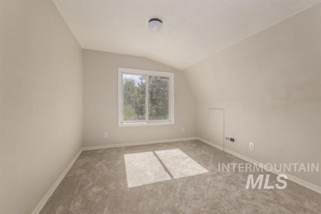 4610 Power Rd, Ontario, OR 97914 - bonus room with carpet flooring, vaulted ceiling, and baseboards
