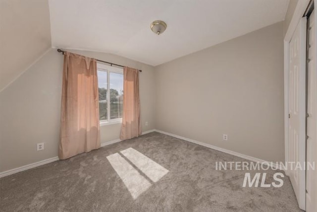 4610 Power Rd, Ontario, OR 97914 - unfurnished bedroom featuring vaulted ceiling, carpet flooring, and baseboards