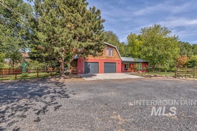 4610 Power Rd, Ontario, OR 97914 - view of front of house featuring a garage and concrete driveway
