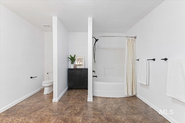 bathroom with visible vents, toilet, a textured ceiling, shower / tub combo, and baseboards