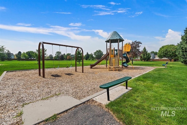 communal playground featuring a yard