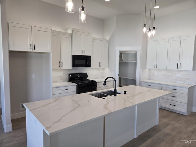 531 Full Moon Way, Twin Falls, ID 83301 - kitchen featuring black appliances, backsplash, a kitchen island with sink, white cabinets, and recessed lighting