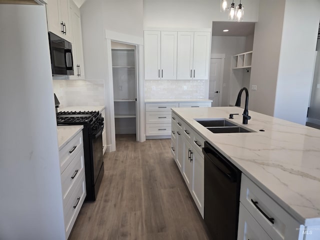 531 Full Moon Way, Twin Falls, ID 83301 - kitchen featuring black appliances, backsplash, and white cabinetry