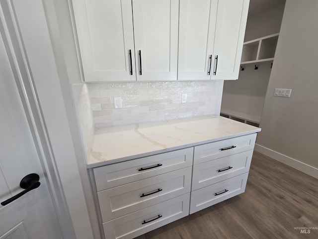 531 Full Moon Way, Twin Falls, ID 83301 - kitchen featuring white cabinets, dark wood-type flooring, light stone countertops, and backsplash