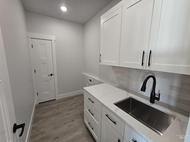 531 Full Moon Way, Twin Falls, ID 83301 - laundry area featuring cabinet space, wood finished floors, and recessed lighting