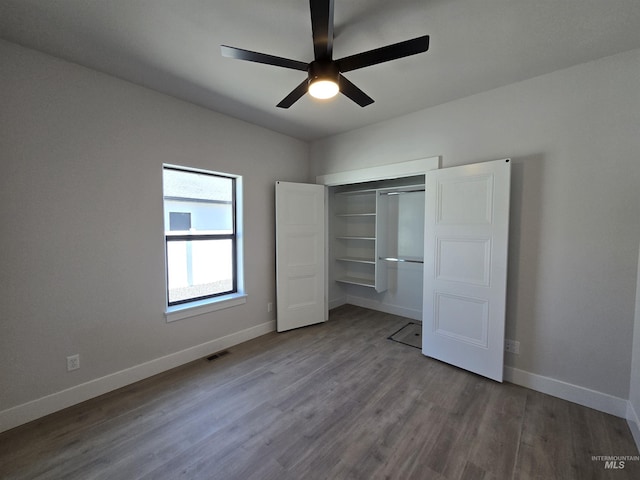 531 Full Moon Way, Twin Falls, ID 83301 - unfurnished bedroom with wood finished floors, a closet, and ceiling fan
