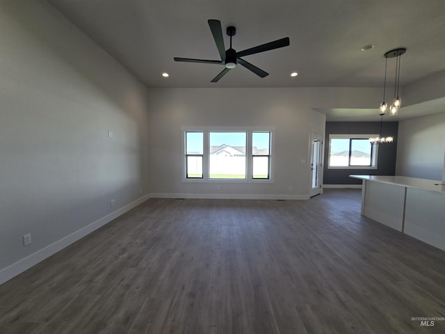 531 Full Moon Way, Twin Falls, ID 83301 - unfurnished living room featuring a chandelier, dark wood-style floors, a ceiling fan, and recessed lighting