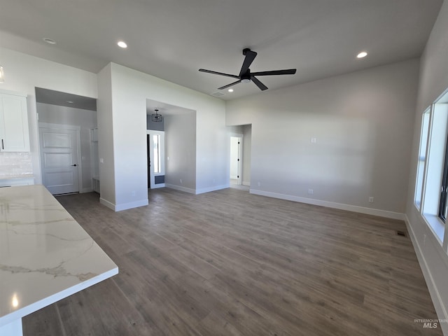 531 Full Moon Way, Twin Falls, ID 83301 - unfurnished living room with a ceiling fan, dark wood-style floors, and recessed lighting