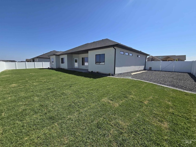531 Full Moon Way, Twin Falls, ID 83301 - back of property with a fenced backyard and stucco siding