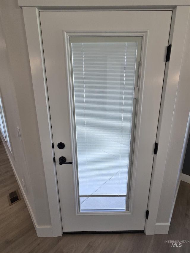 531 Full Moon Way, Twin Falls, ID 83301 - doorway to outside featuring wood finished floors and healthy amount of natural light