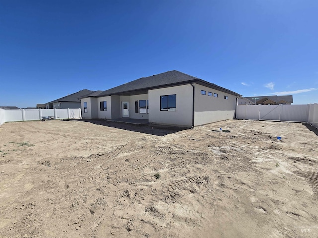 531 Full Moon Way, Twin Falls, ID 83301 - back of house featuring a fenced backyard and stucco siding