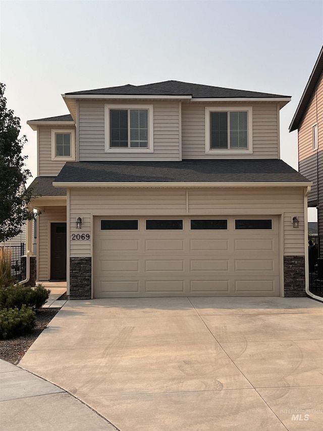 view of front of home with a garage