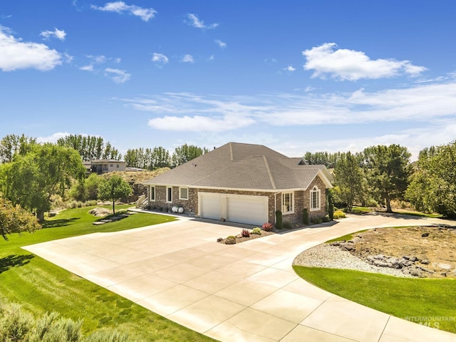 view of front facade with a front lawn and a garage