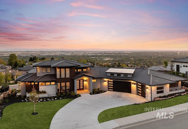 1519 S Galaxy Way, Boise, ID 83712 - view of front of property with a tile roof, a garage, driveway, and a yard