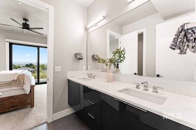 1519 S Galaxy Way, Boise, ID 83712 - ensuite bathroom featuring double vanity and a ceiling fan