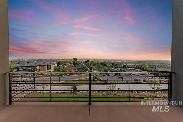 1519 S Galaxy Way, Boise, ID 83712 - balcony at dusk featuring a residential view