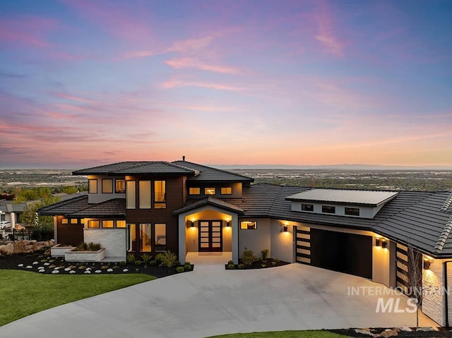 1519 S Galaxy Way, Boise, ID 83712 - prairie-style house with driveway, a garage, and a yard