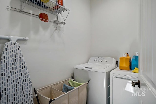 laundry area featuring separate washer and dryer