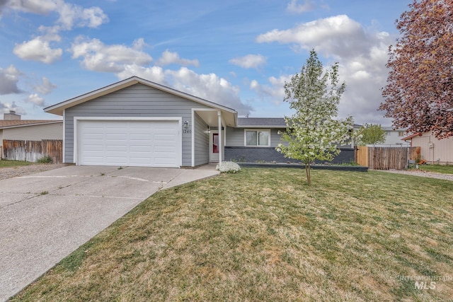 ranch-style house featuring fence, driveway, a front yard, and a garage