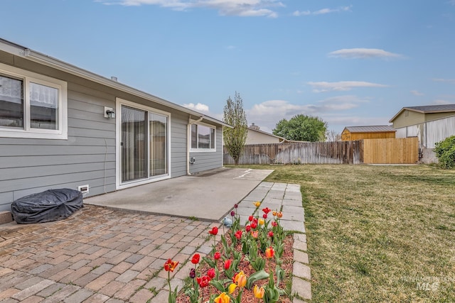 view of patio featuring fence