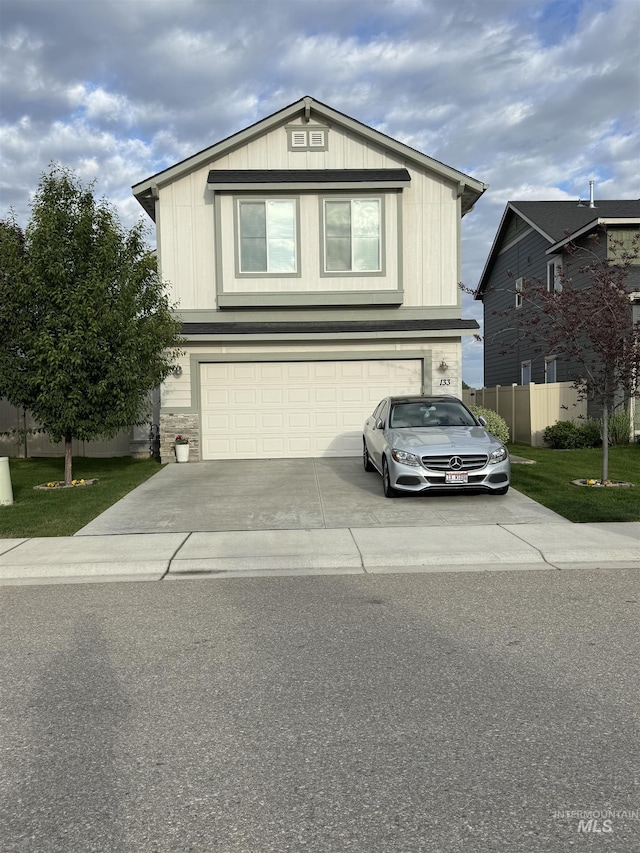 133 S Baraya Way, Meridian, ID 83642 - traditional-style home with an attached garage, concrete driveway, and stone siding