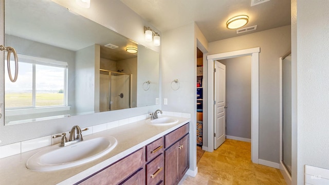 133 S Baraya Way, Meridian, ID 83642 - full bathroom with a stall shower, a walk in closet, double vanity, and baseboards