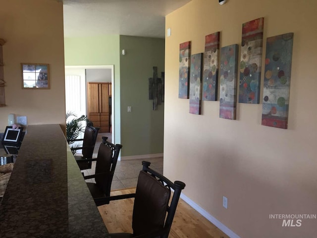interior space featuring baseboards