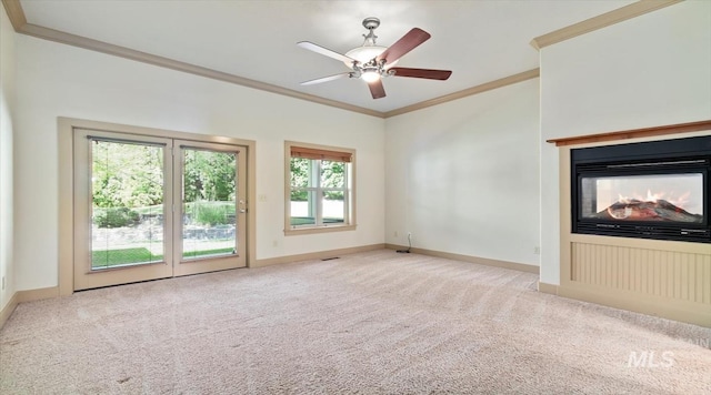 1563 W Colville Ct, Eagle, ID 83616 - unfurnished living room with crown molding, carpet floors, a multi sided fireplace, and ceiling fan