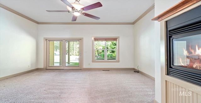 1563 W Colville Ct, Eagle, ID 83616 - carpeted spare room with crown molding and a ceiling fan
