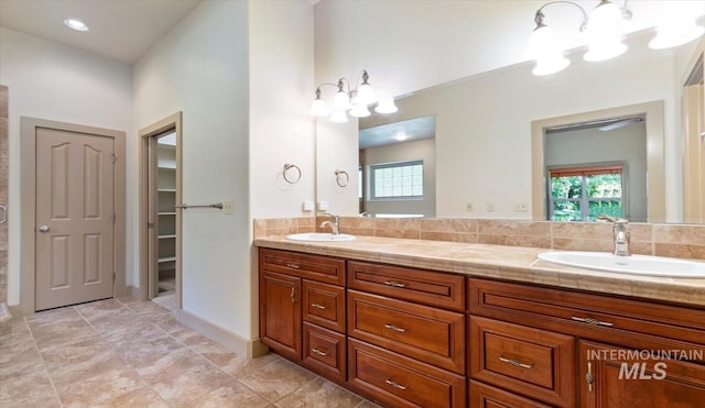 1563 W Colville Ct, Eagle, ID 83616 - full bathroom featuring double vanity and a chandelier