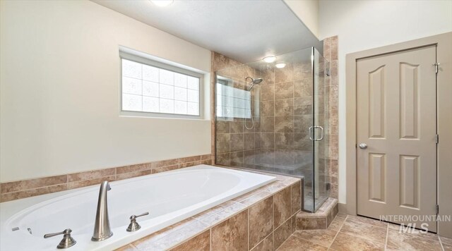 1563 W Colville Ct, Eagle, ID 83616 - bathroom with a bath and a shower stall