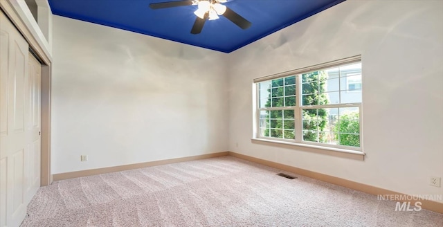 1563 W Colville Ct, Eagle, ID 83616 - spare room featuring carpet flooring and ceiling fan