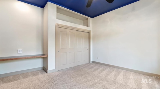 1563 W Colville Ct, Eagle, ID 83616 - unfurnished bedroom featuring carpet flooring, a closet, and a ceiling fan