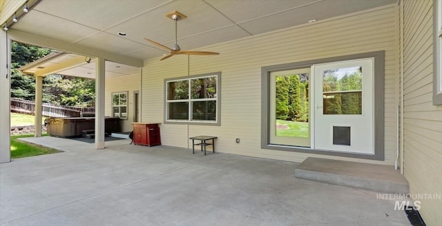 1563 W Colville Ct, Eagle, ID 83616 - view of patio / terrace with a hot tub and a ceiling fan