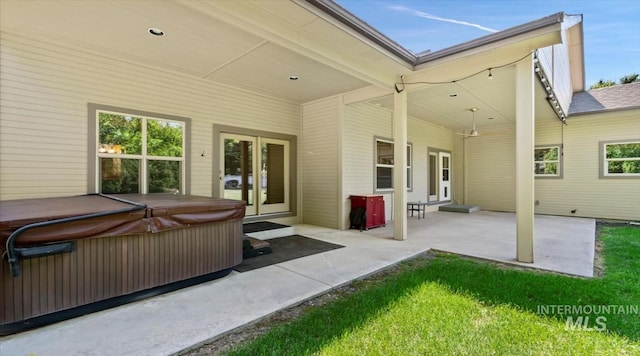 1563 W Colville Ct, Eagle, ID 83616 - view of patio / terrace featuring a hot tub and french doors