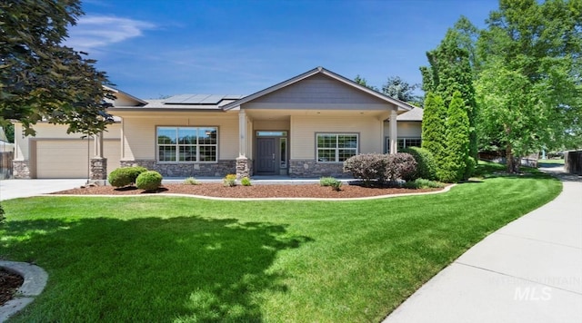 1563 W Colville Ct, Eagle, ID 83616 - craftsman-style home featuring a front lawn, roof mounted solar panels, stone siding, concrete driveway, and an attached garage