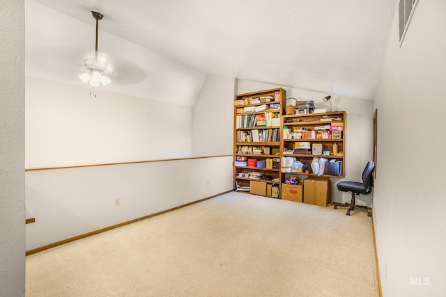 interior space with carpet flooring, ceiling fan, visible vents, and lofted ceiling
