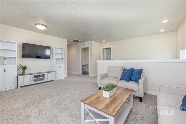 19118 Ralston Way, Caldwell, ID 83605 - carpeted living room featuring recessed lighting and a textured ceiling