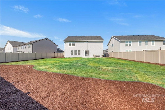 19118 Ralston Way, Caldwell, ID 83605 - back of house featuring a fenced backyard and a residential view