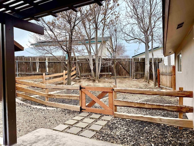 view of yard featuring an outbuilding and an exterior structure